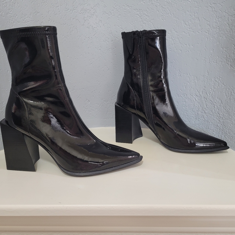 Black patent leather boots worn only once and in excellent condition